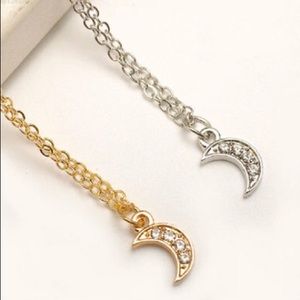 Crystal moon necklaces.